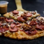 Logo de Canelo’s Pizza